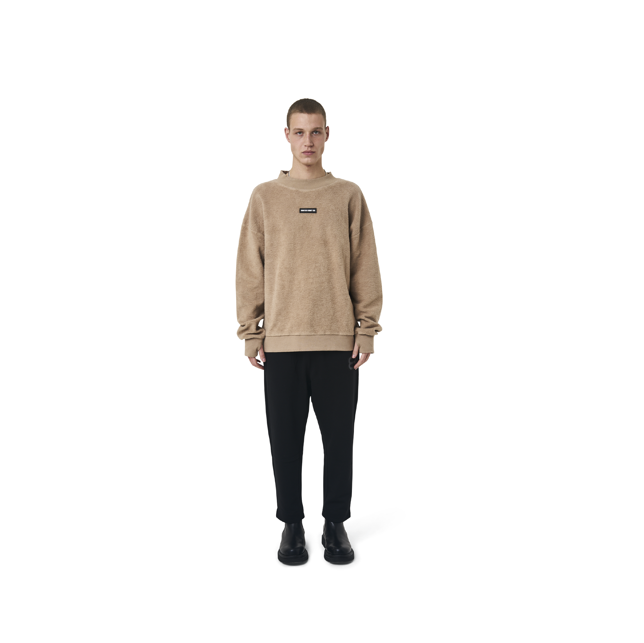 Long sleeves loose cut jumper in  burnt beige color fabric featuring Eighteen Eighty-Six embroidered at front. Rib knit at cuffs and hem.