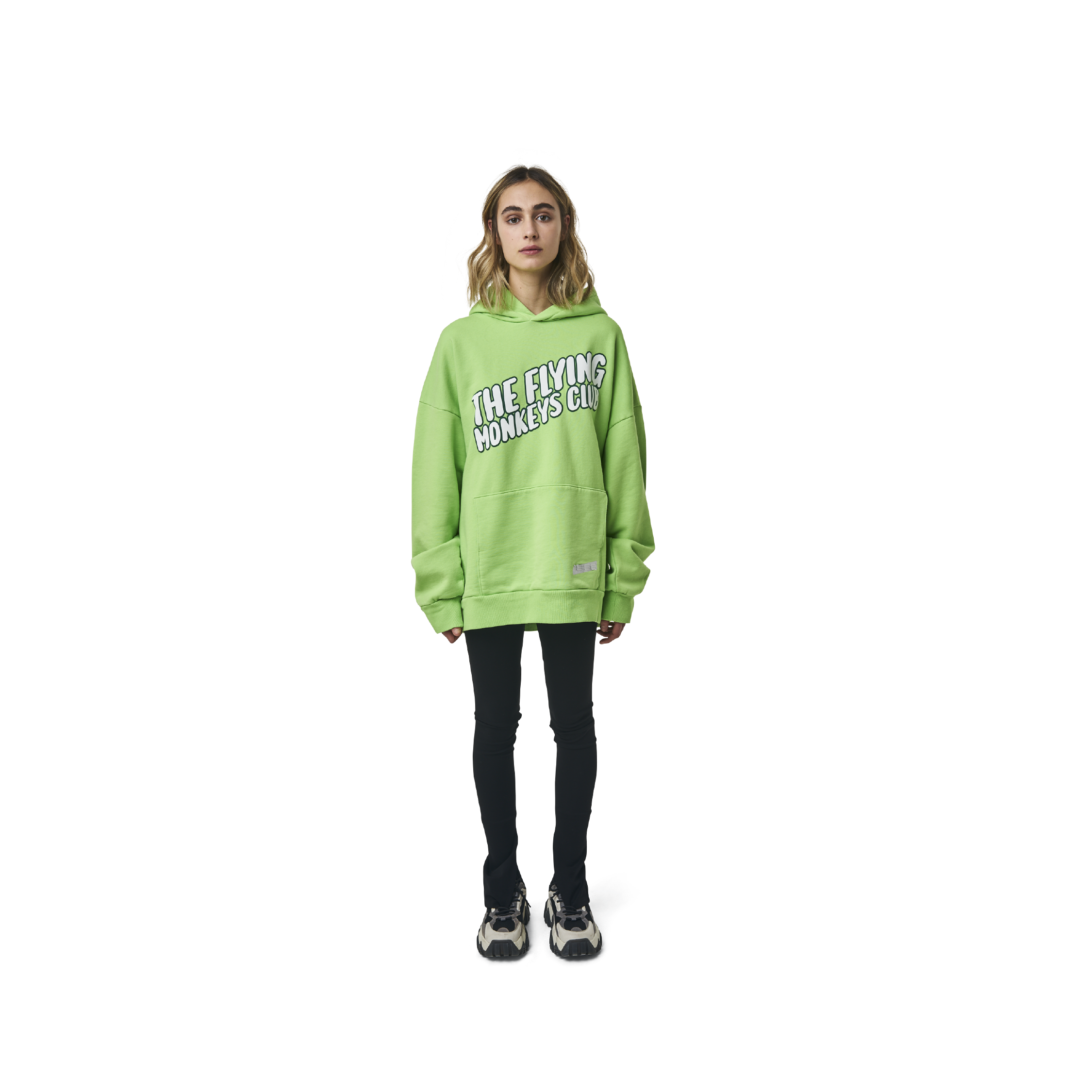 Long sleeves oversize cut hoodie in washed neon green color fabric featuring ' The Flying Monkeys Club ' logo print at front and at back. 1886 logo embroidered at kangaroo pocket. Rib knit at cuffs and hem.