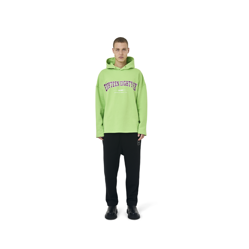 Long sleeves Loose cut hoodie in neon green color fabric featuring Eighteen Eighty-Six print at front. 1886 logo embroidered at bottom front. Loose at cuffs and hem.