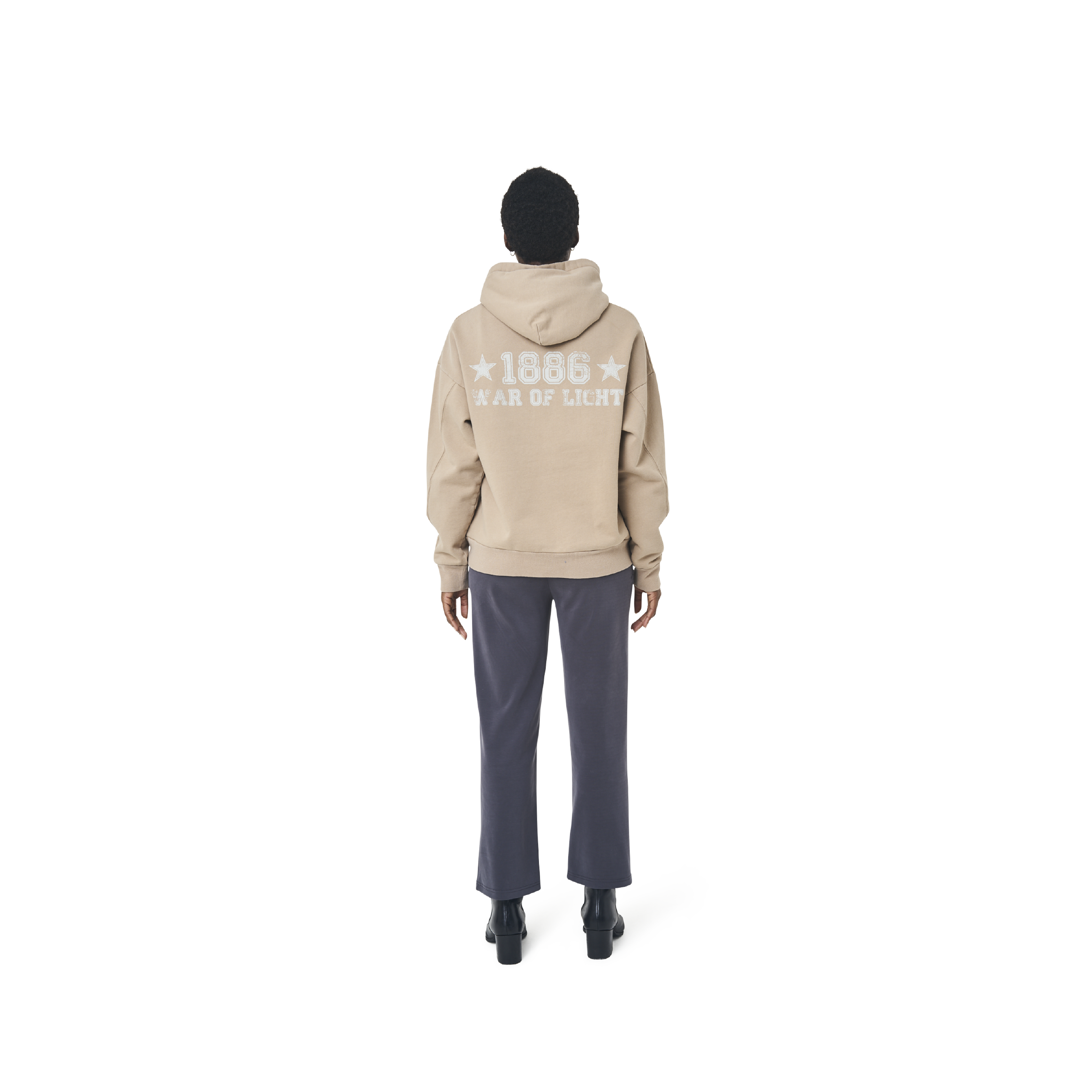 Long sleeves oversize cut hoodie in washed burnt beige color fabric featuring 1886 print at back. 1886 logo embroidered at kangaroo pocket. A button on the hood. Rib knit at cuffs and hem
