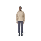 Long sleeves oversize cut hoodie in washed burnt beige color fabric featuring 1886 print at back. 1886 logo embroidered at kangaroo pocket. A button on the hood. Rib knit at cuffs and hem
