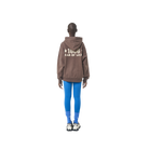 Long sleeves oversize cut hoodie in washed brown color fabric featuring 1886 print at back. 1886 logo embroidered at kangaroo pocket. A button on the hood. Rib knit at cuffs and hem