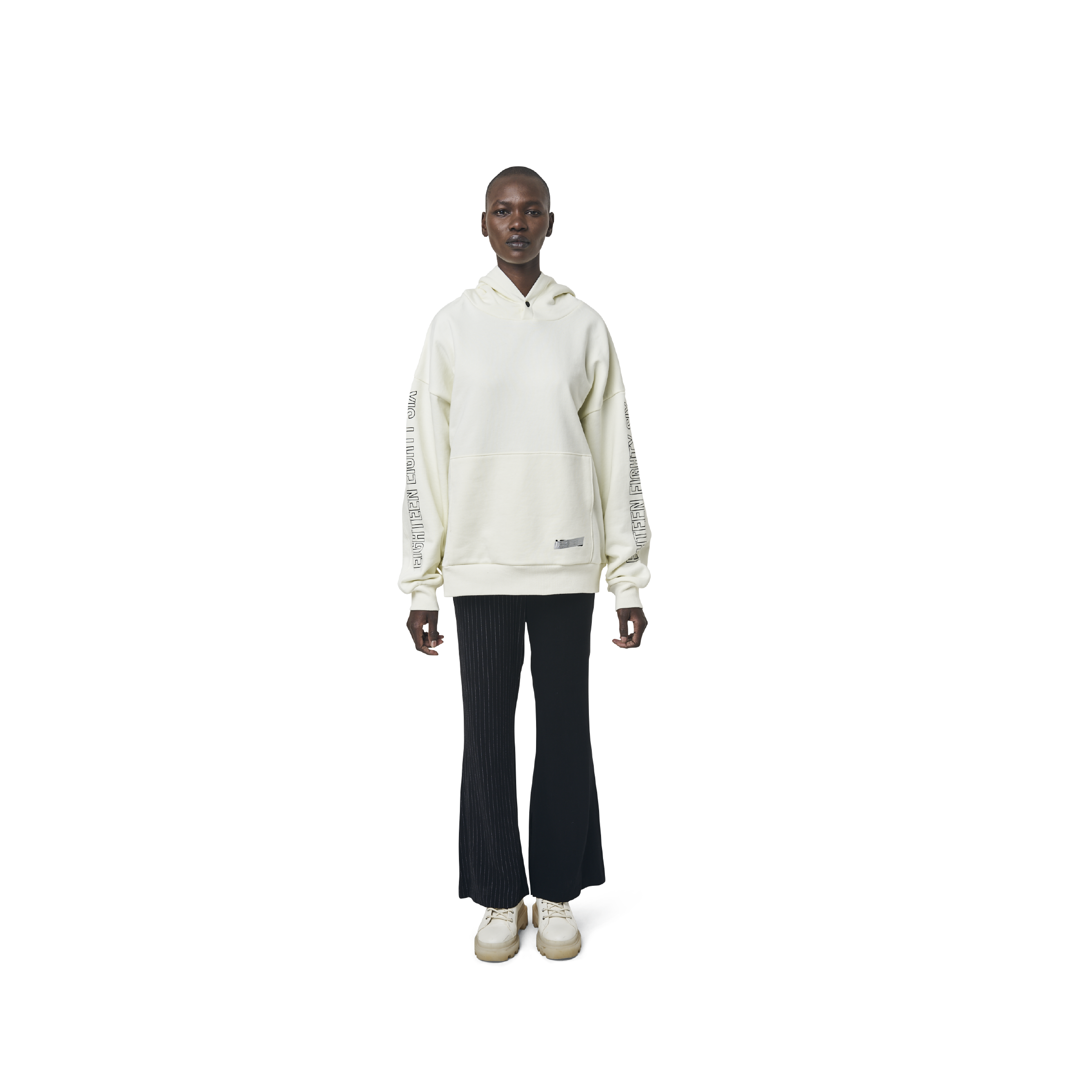 Long sleeves oversize cut hoodie in washed off white color fabric featuring 1886 print at sleeves. 1886 logo embroidered at kangaroo pocket. A button on the hood. Rib knit at cuffs and hem.