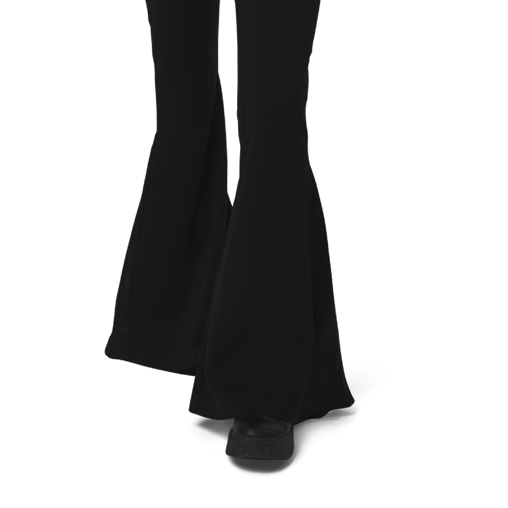 Classic fit charleston cut pants in black fabric featuring Eighteen Eighty-Six logo patch sewn at waist. High waist.