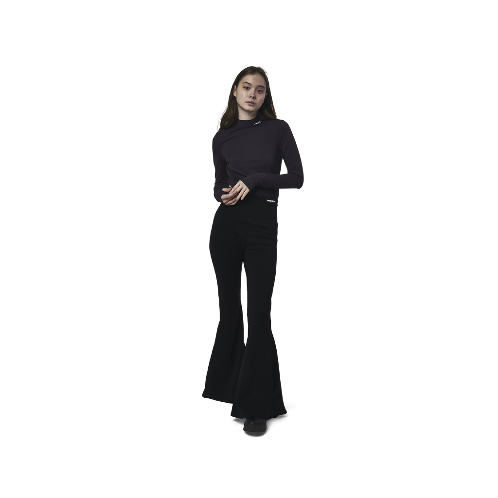 Classic fit charleston cut pants in black fabric featuring Eighteen Eighty-Six logo patch sewn at waist. High waist.