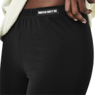 Classic leggings in black fabric featuring Eighteen Eighty-Six logo patch sewn at Elastic waistband. Open at ankle cuffs.