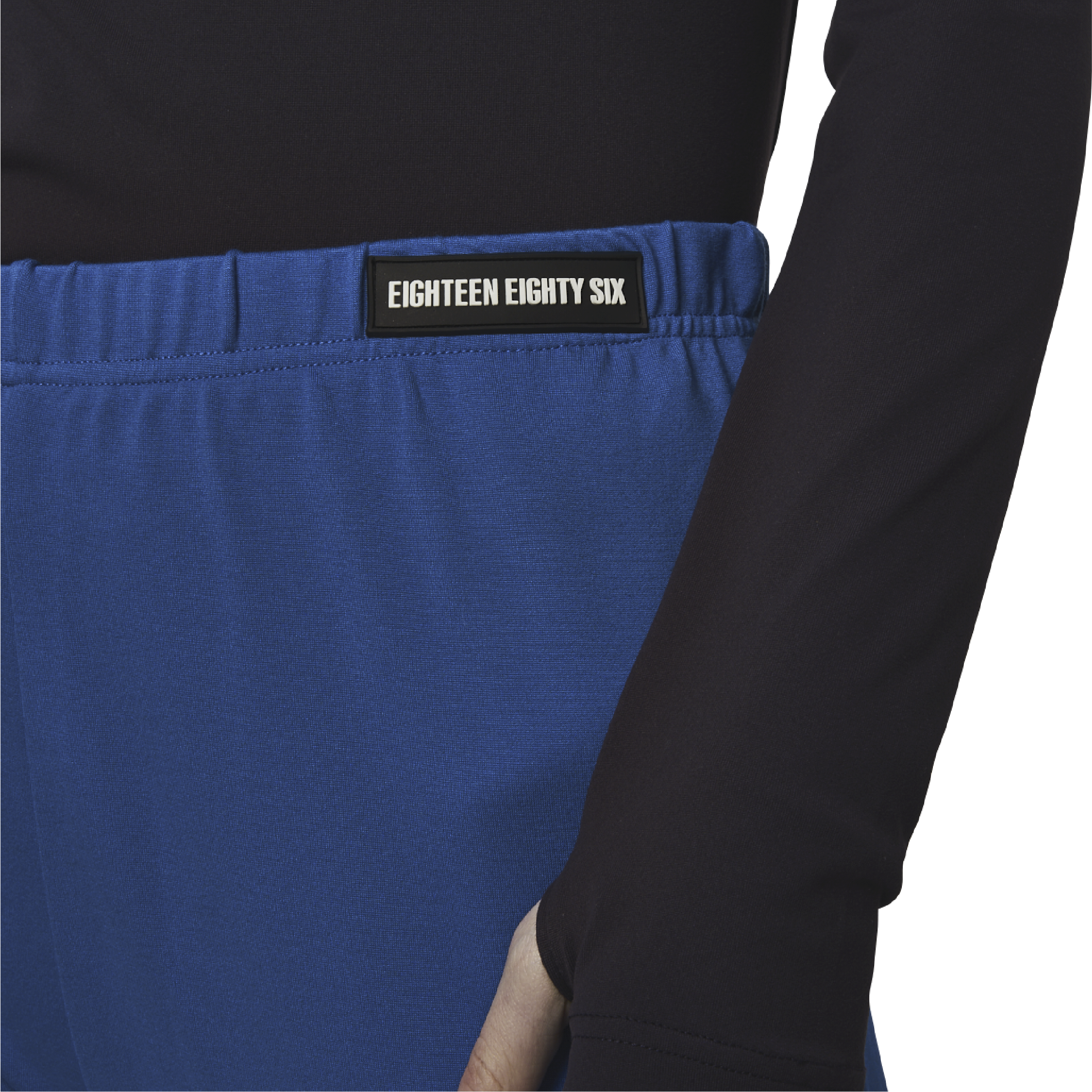 Classic leggings in blue fabric featuring Eighteen Eighty-Six logo patch sewn at Elastic waistband. Open at ankle cuffs.