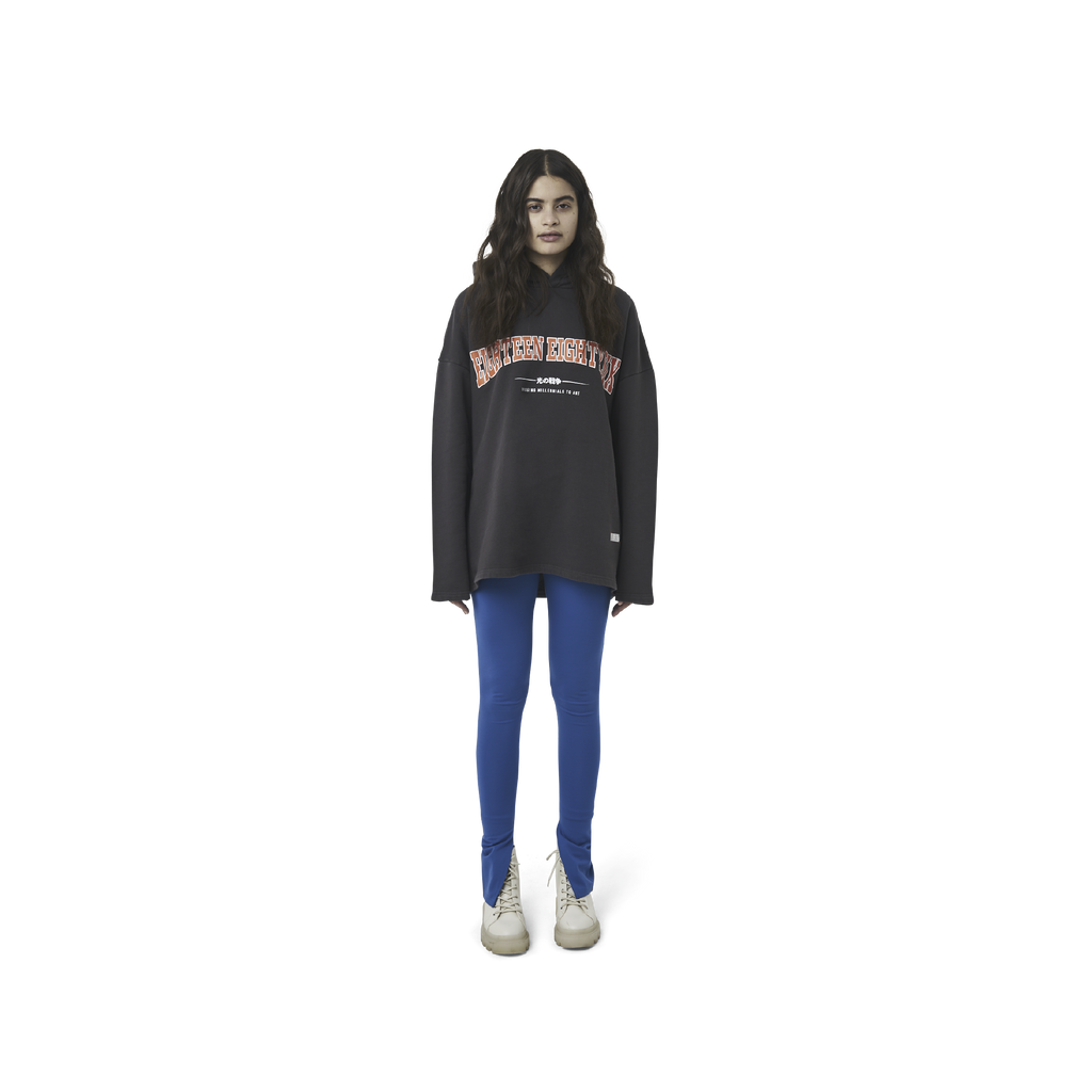 Classic leggings in blue fabric featuring Eighteen Eighty-Six logo patch sewn at Elastic waistband. Open at ankle cuffs.