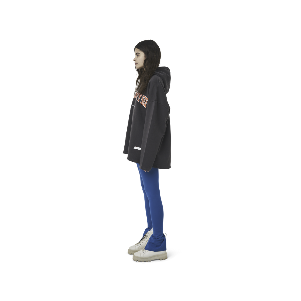 Classic leggings in blue fabric featuring Eighteen Eighty-Six logo patch sewn at Elastic waistband. Open at ankle cuffs.