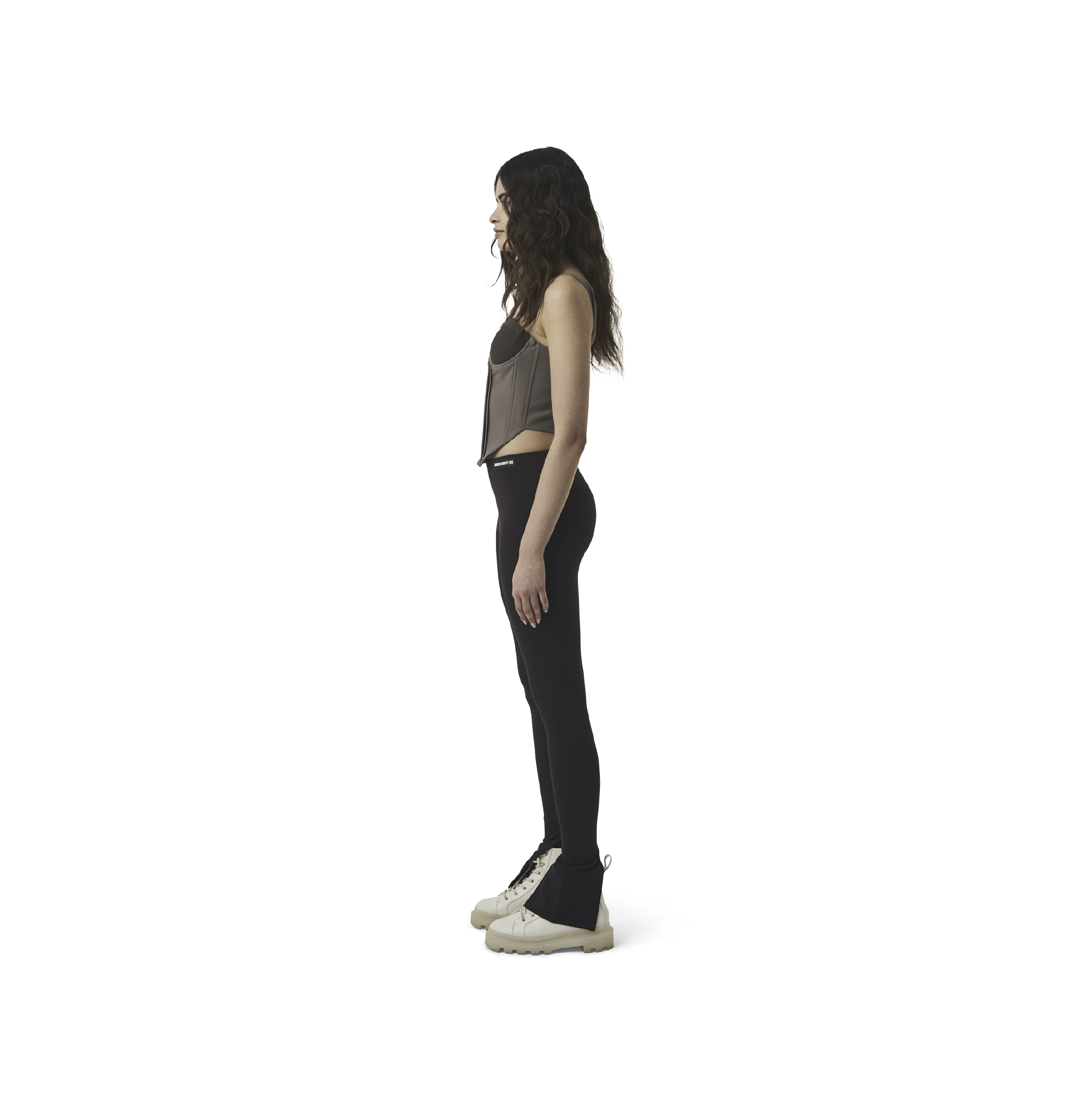 Classic leggings in coffee brown fabric featuring Eighteen Eighty-Six logo patch sewn at Elastic waistband. Open at ankle cuffs.