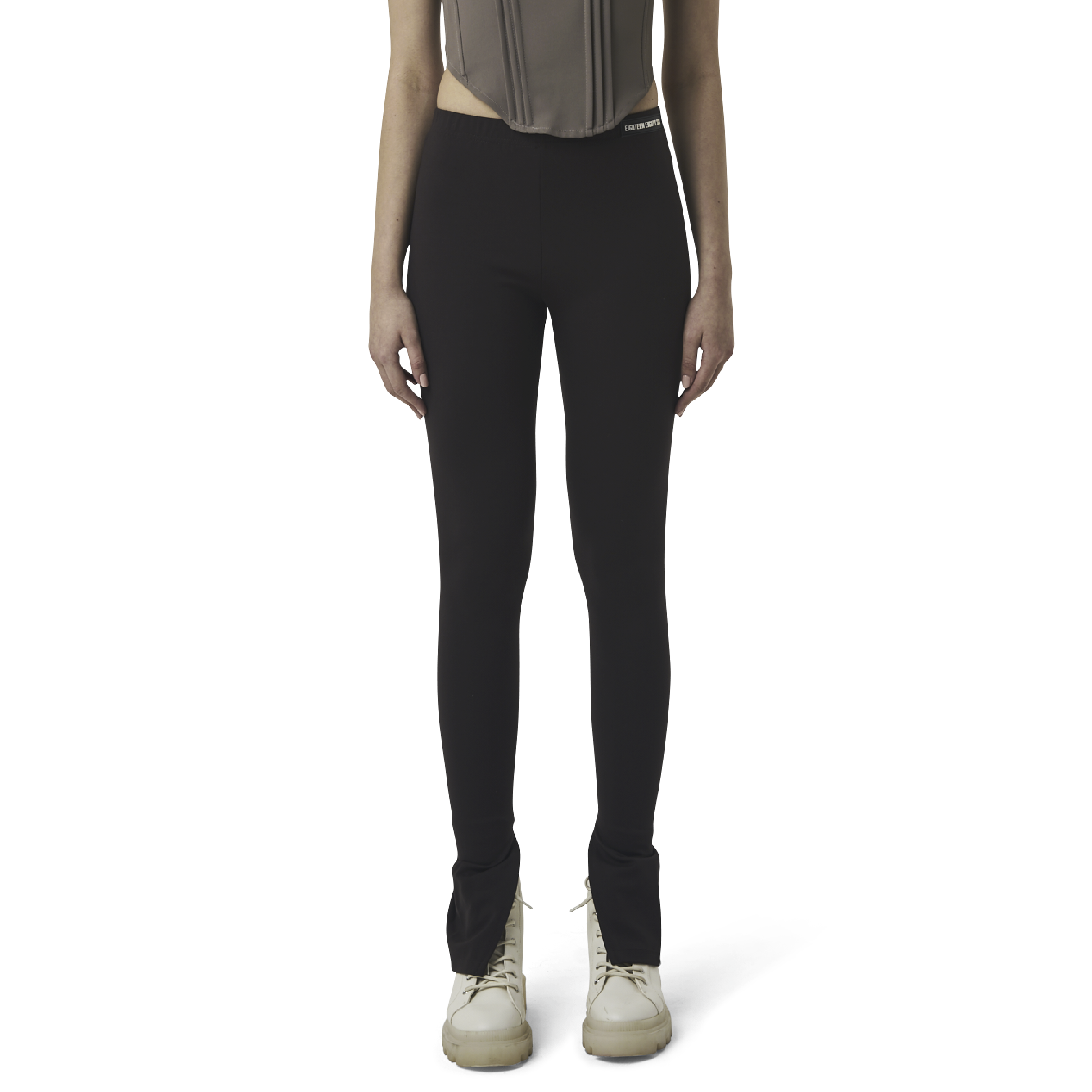 Classic leggings in coffee brown fabric featuring Eighteen Eighty-Six logo patch sewn at Elastic waistband. Open at ankle cuffs.