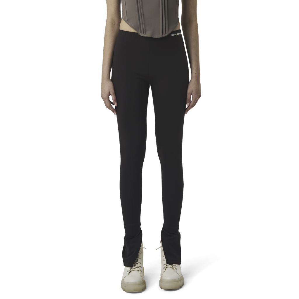 Classic leggings in coffee brown fabric featuring Eighteen Eighty-Six logo patch sewn at Elastic waistband. Open at ankle cuffs.