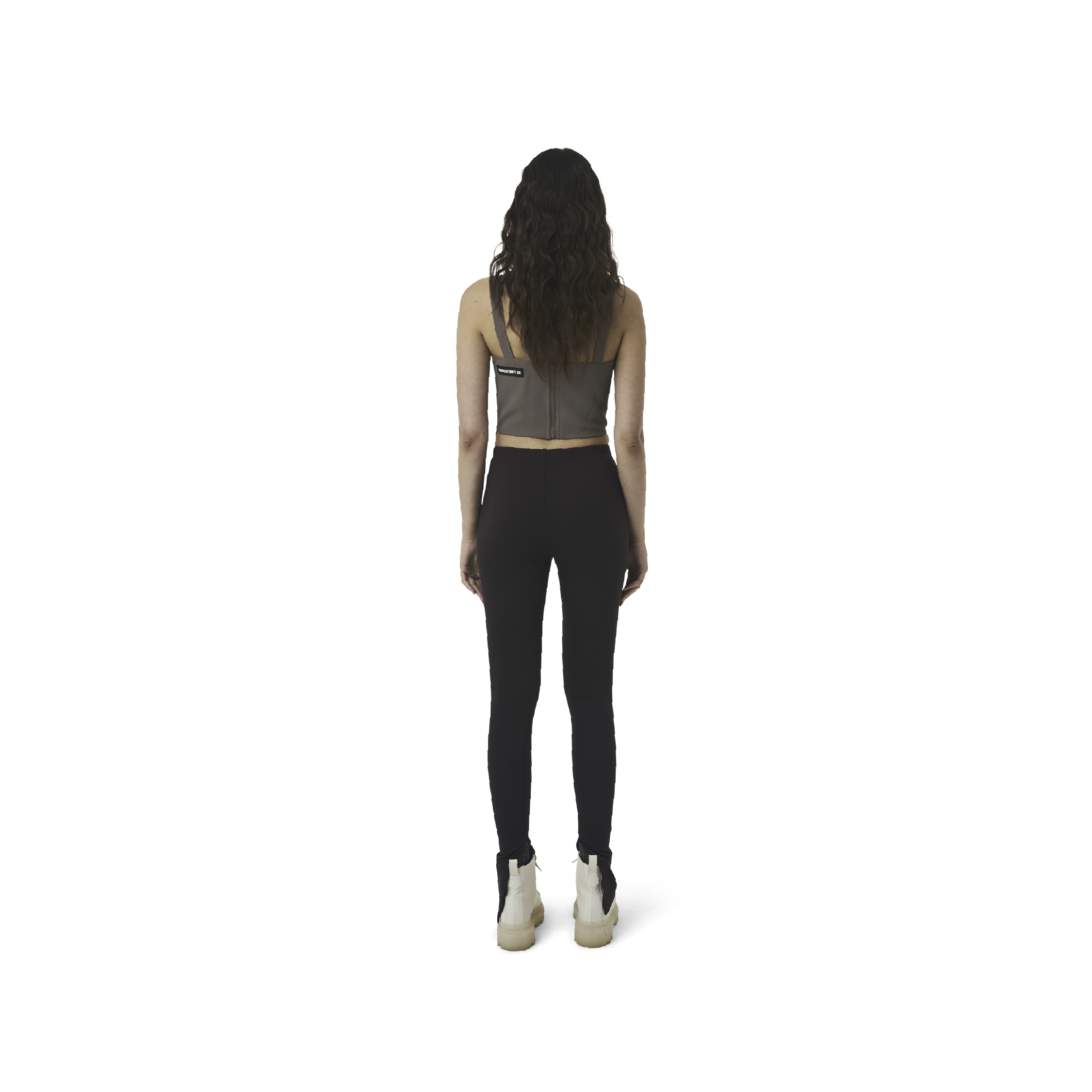 Classic leggings in coffee brown fabric featuring Eighteen Eighty-Six logo patch sewn at Elastic waistband. Open at ankle cuffs.