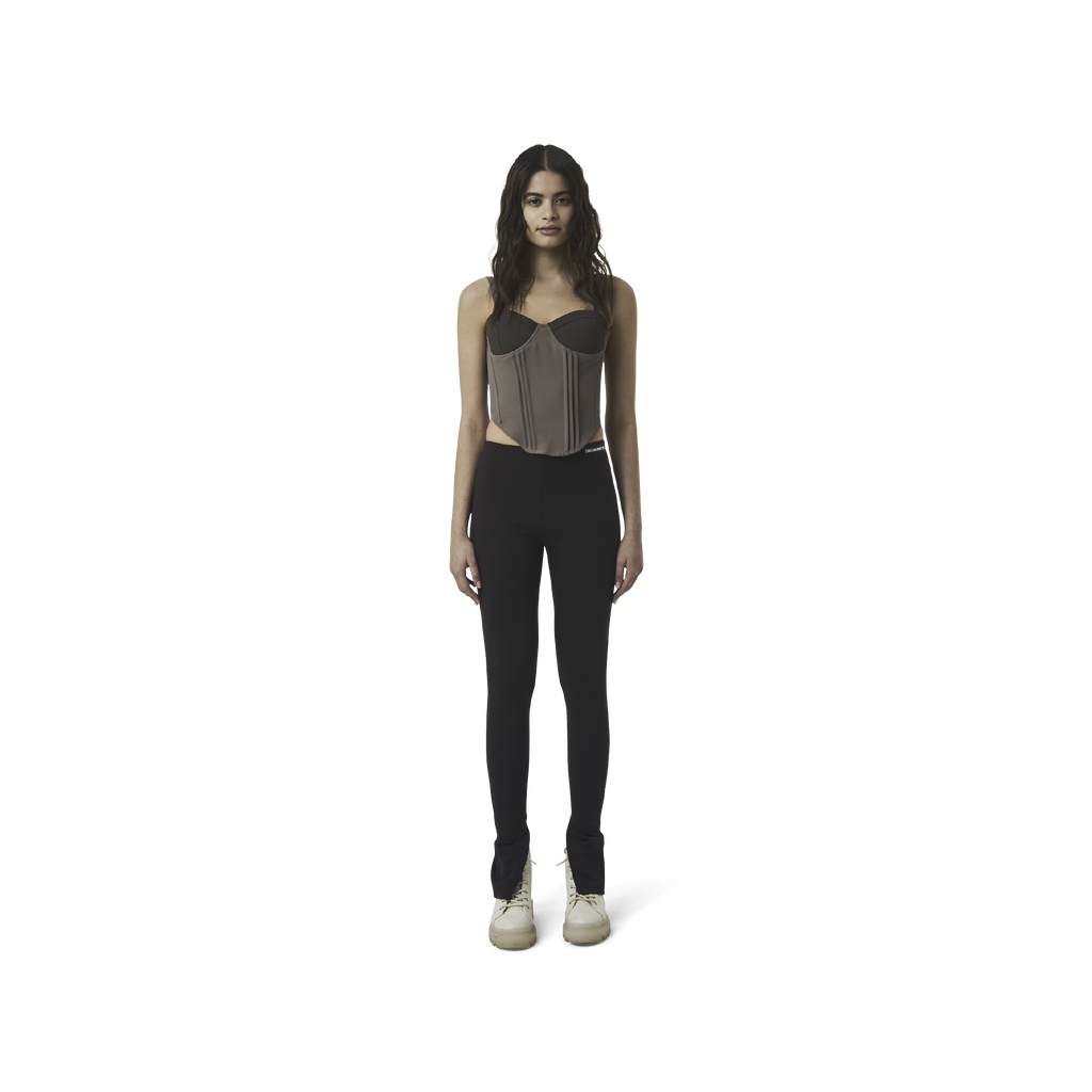 Classic leggings in coffee brown fabric featuring Eighteen Eighty-Six logo patch sewn at Elastic waistband. Open at ankle cuffs.