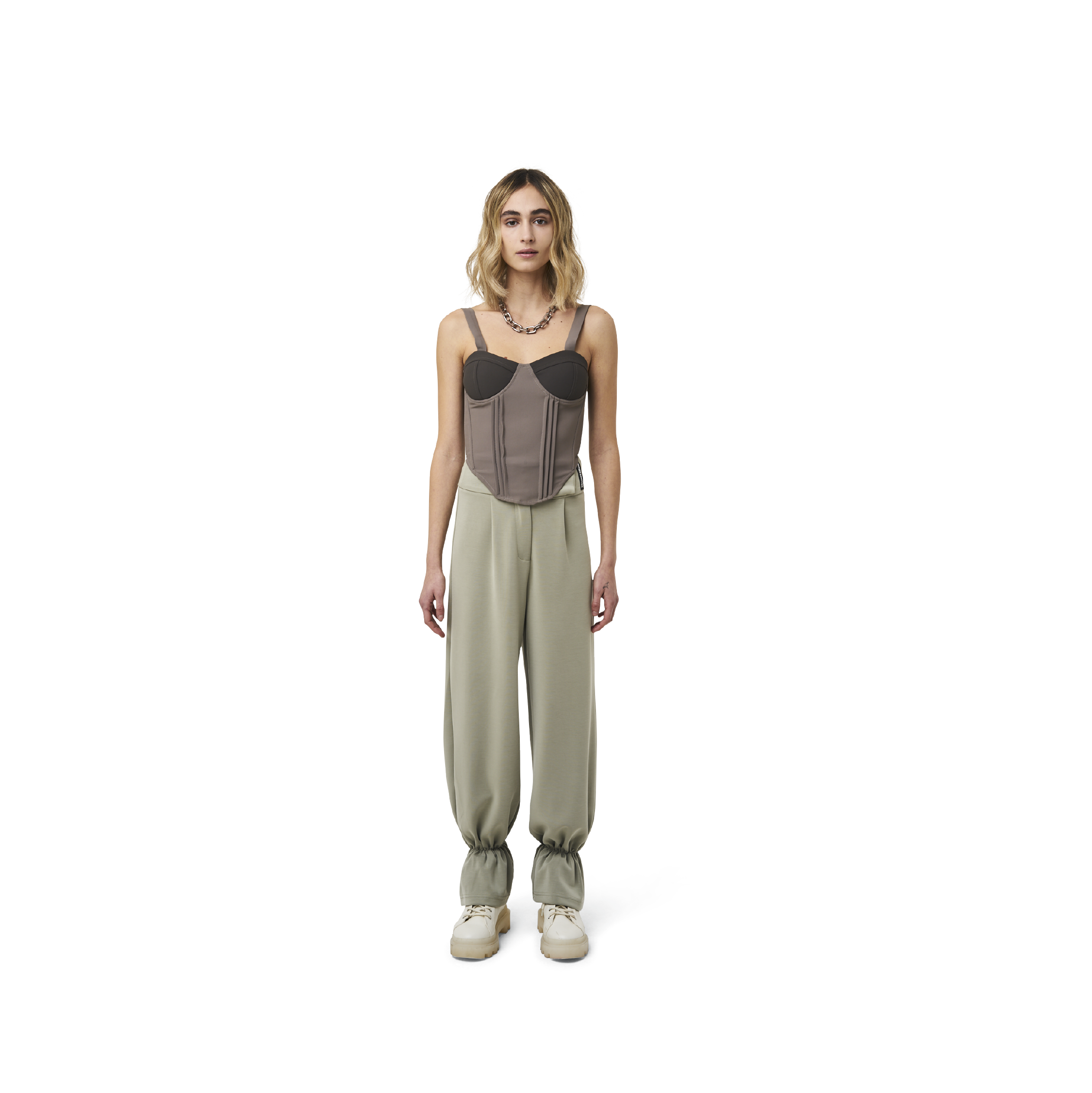 Cropped corset top in mix green fabric color featuring lines details at front. logo patch sewn at Scoop neck. Full zipper at back.